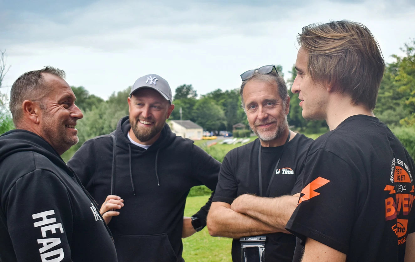 the attendees at the Peche Fishing Game event wearing litime t-shirt