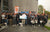 A large group photo of the participants at the Concours Fish Protect tournament, with the winner holding a prize check