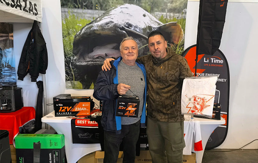 the attendee holding a litime prize battery and t-shirt at the Hungarian Fishing Expo