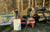 Two anglers pose with their winning bass and litime sponsor banners at the Electric Bass Anglers event