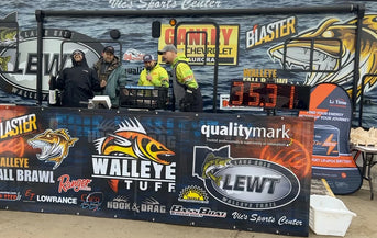Anglers celebrate a 35.31 lb weigh-in on the LEWT stage, with a Li Time sponsor banner