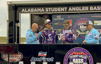 Two student anglers from the "Hawks Fishing" team are interviewed on stage at an Alabama Student Angler tournament