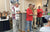 A veteran receives an award plaque on stage during a ceremony for the Heroes on the Water nonprofit kayak fishing event