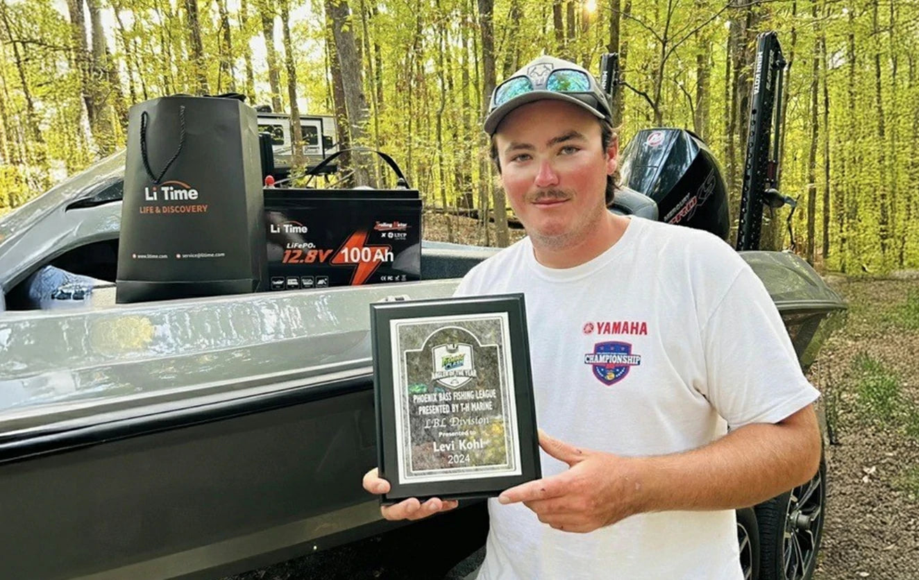 customer holding an award alongside a LiTime 12.8V 100Ah battery, showcasing positive LiTime MLF review and satisfaction