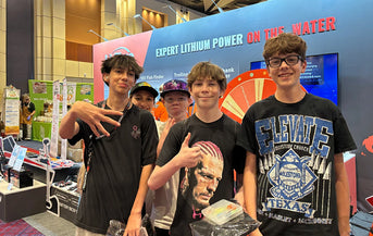 young anglers at litime's 'Expert Lithium Power' booth, Bass Master affiliated fishing event