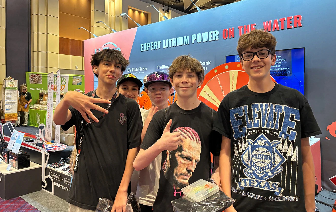 young anglers at litime's 'Expert Lithium Power' booth, Bass Master affiliated fishing event