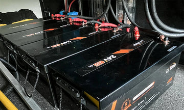 close-up of multiple LiTime 24V 230Ah batteries connected together, showcasing a positive LiTime customer review