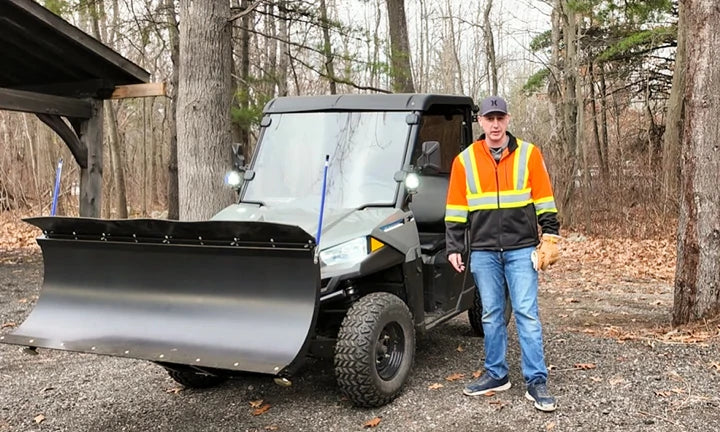 litime lithium golf cart battery customer review: a man stands beside a utility vehicle with a snow plow