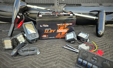 A LiTime 100Ah trolling motor battery ready to power a kayak's fish finder, LED lights, and accessories.