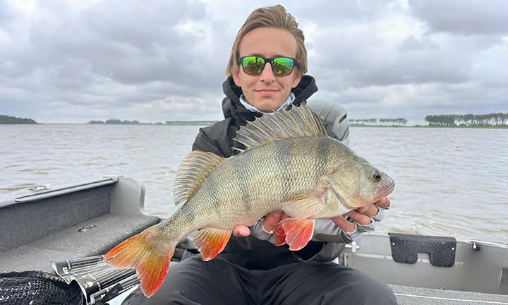 LiTime customer reviews featuring a user holding a large fish, showcasing outdoor enjoyment
