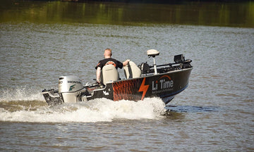  boat powered by LiTime battery speeding across the water, showcasing positive LiTime customer feedback on performance