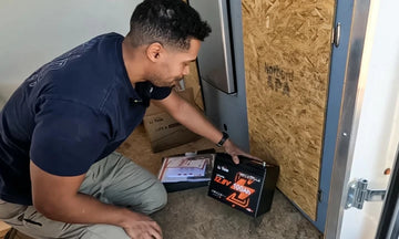 litime customer review with a man holding group 24 12v 100ah self heating battery